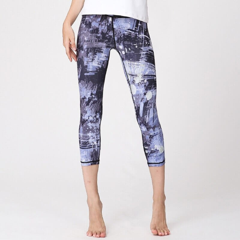 Women's floral high-waist sports leggings, perfect for yoga and running, showcasing a stylish blue print design.